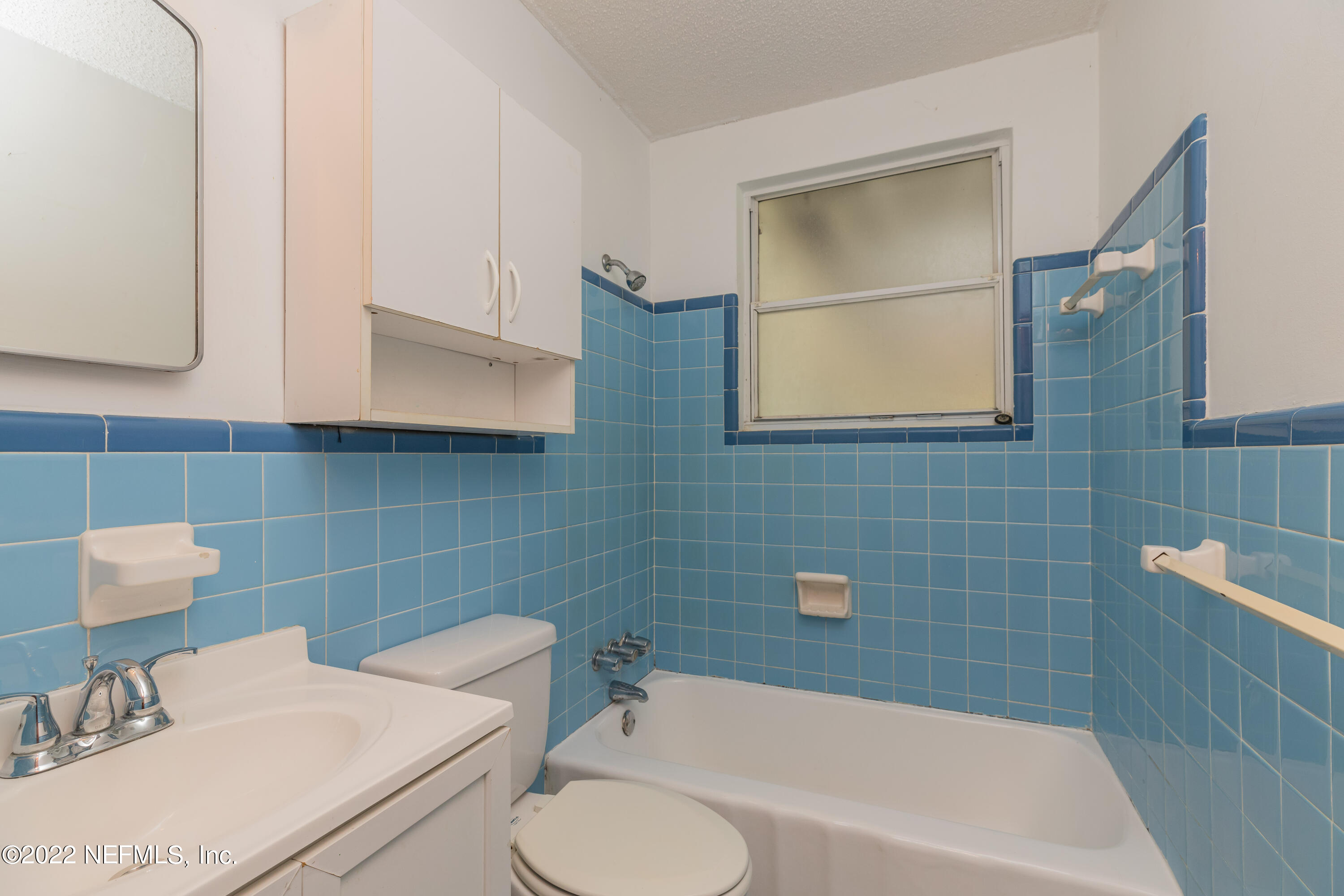 306 Ribault Street St. Augustine, FL 32080 - Photo 26 of 31 a bathroom with a sink toilet and bathtub
