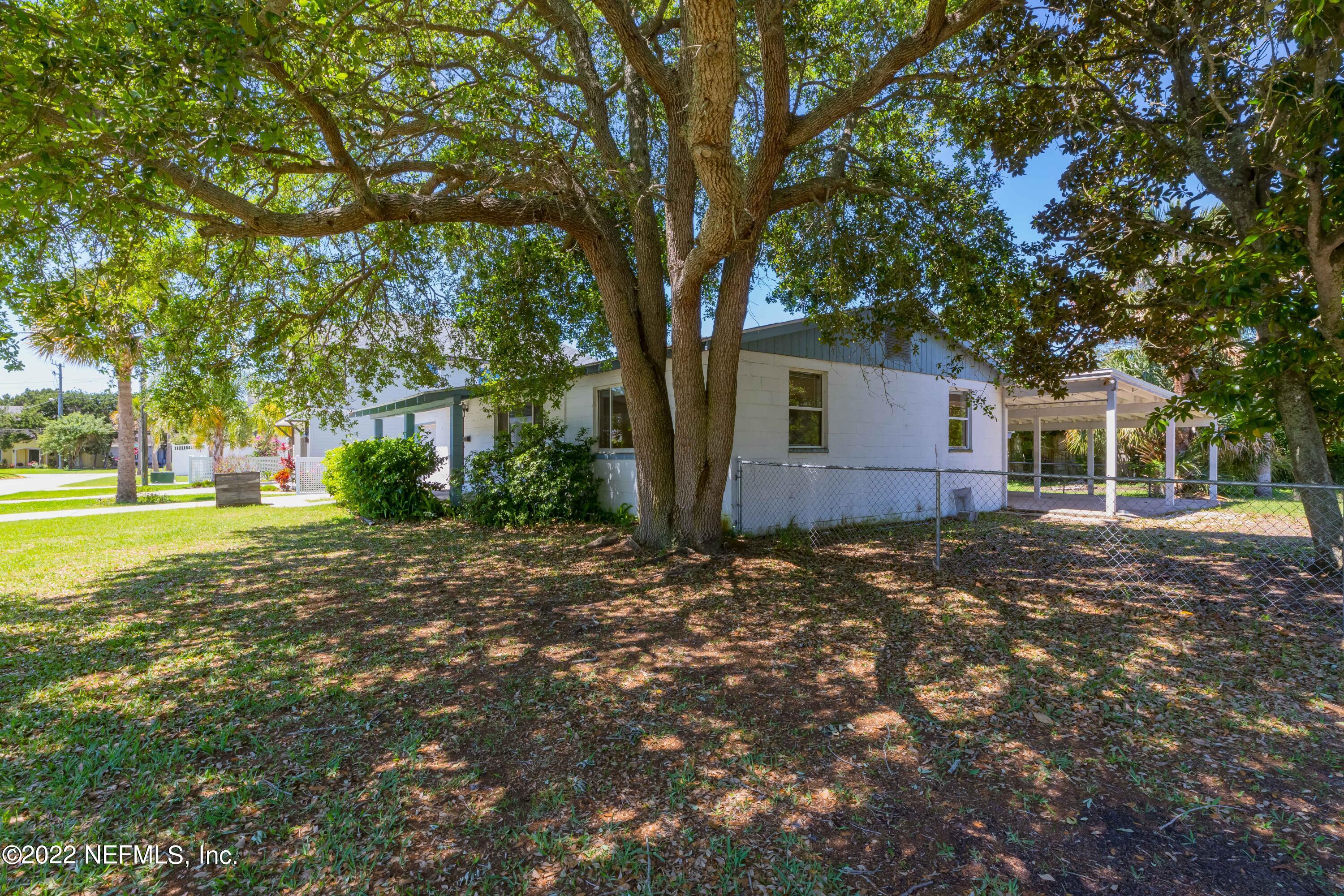 306 Ribault Street St. Augustine, FL 32080 - Photo 4 of 31 a view of a house with a tree