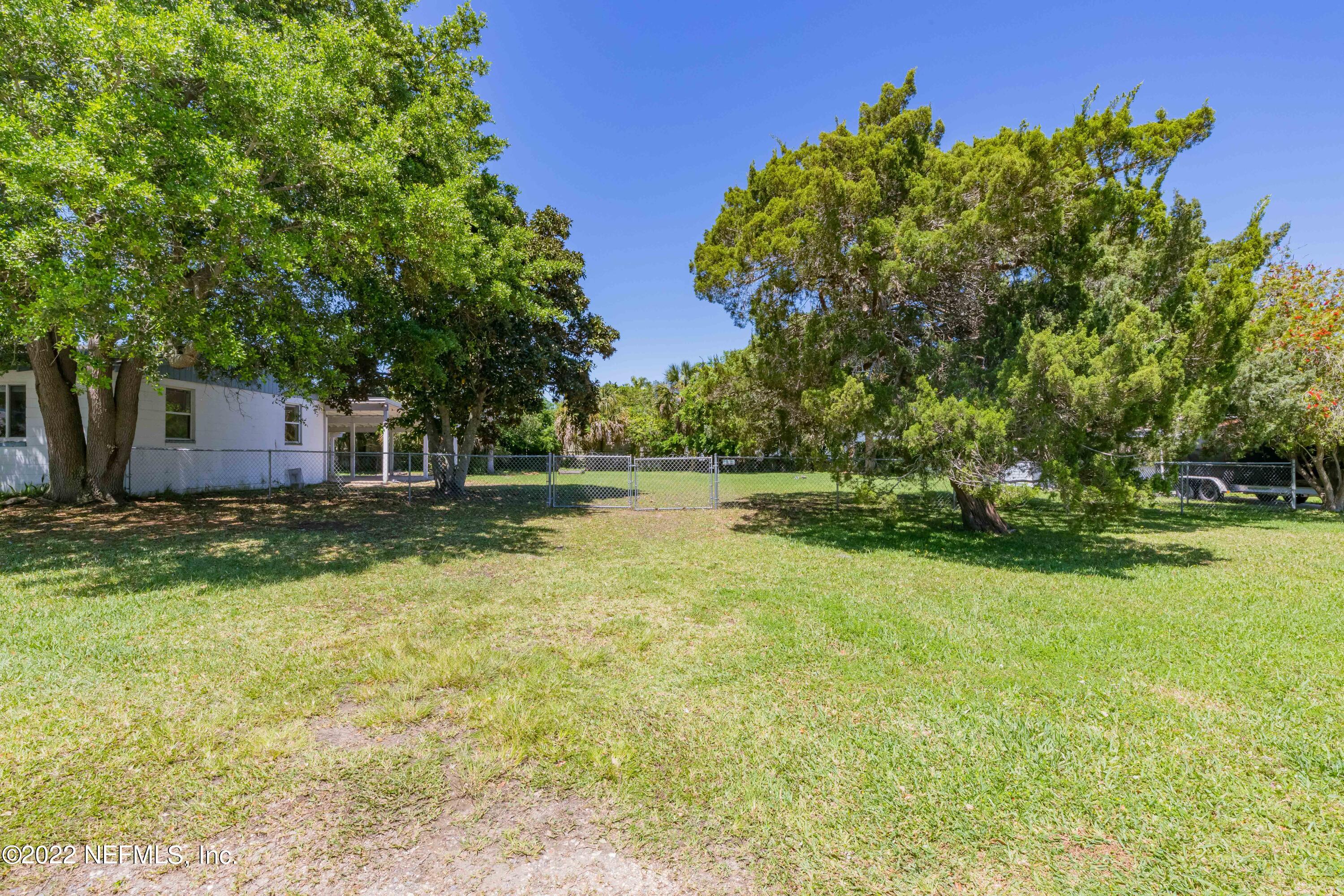 306 Ribault Street St. Augustine, FL 32080 - Photo 6 of 31 a view of a house with a yard