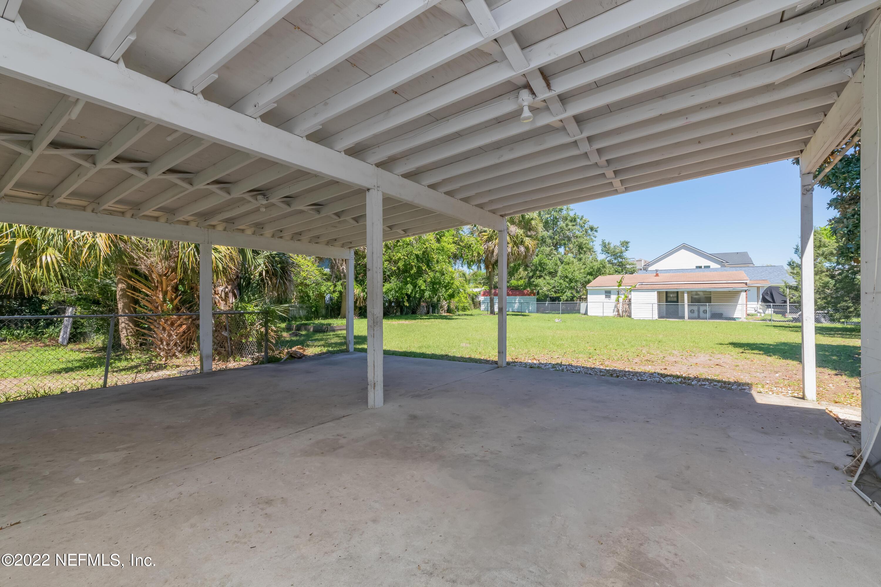 306 Ribault Street St. Augustine, FL 32080 - Photo 8 of 31 a view of a house with a backyard
