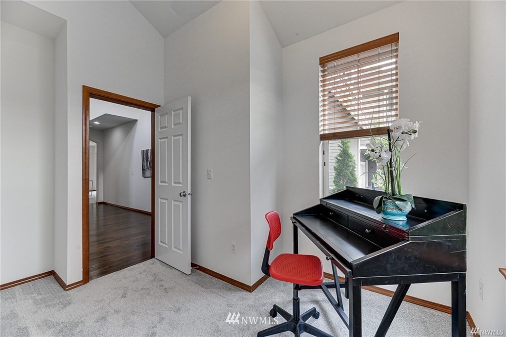 23007 42nd Drive Southeast Bothell, WA 98021 - Photo 16 of 29 a room with furniture and a window