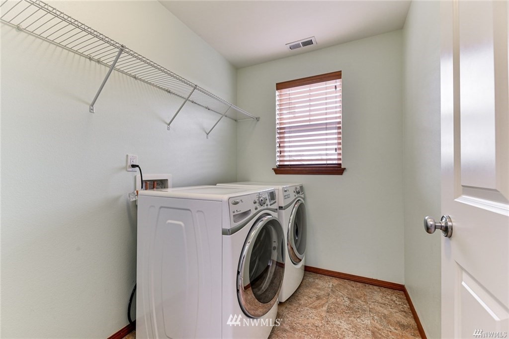 23007 42nd Drive Southeast Bothell, WA 98021 - Photo 18 of 29 a utility room with dryer and washer
