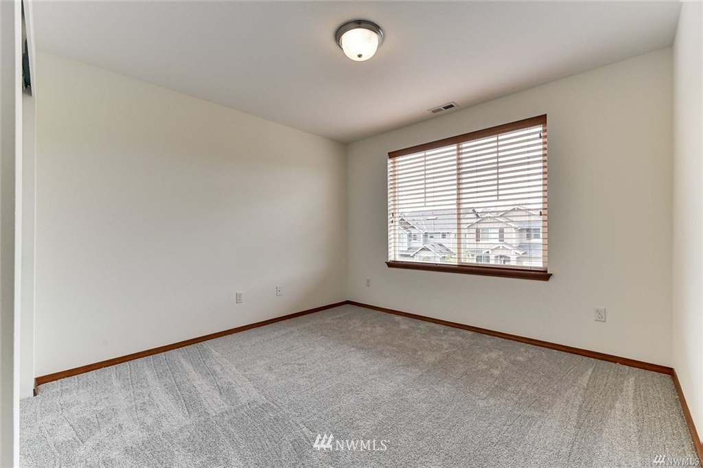 23007 42nd Drive Southeast Bothell, WA 98021 - Photo 23 of 29 an empty room with windows