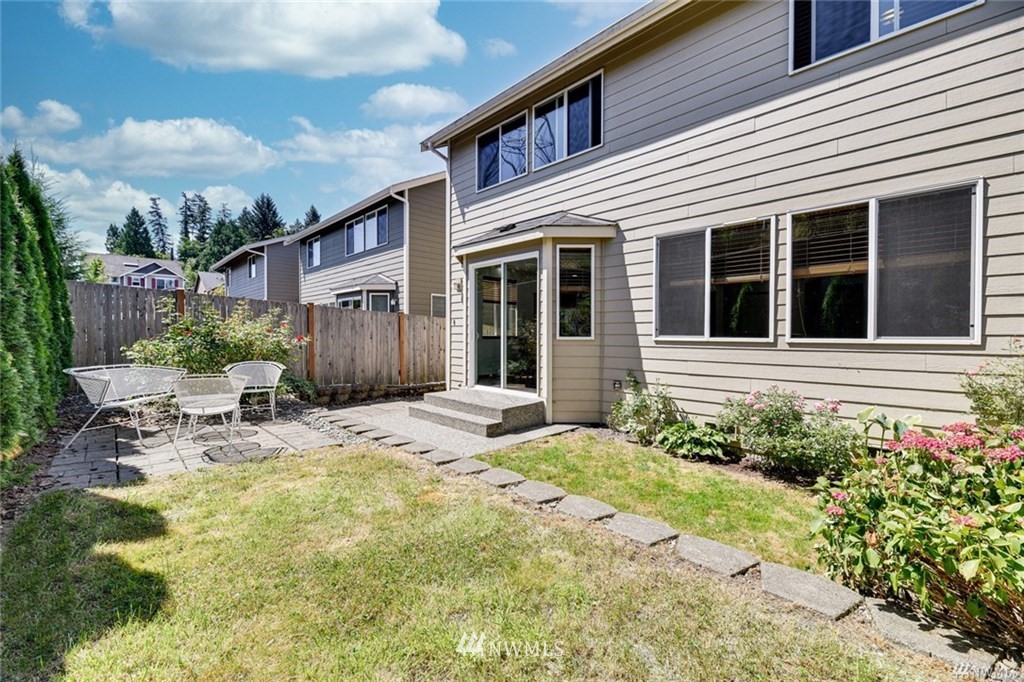 23007 42nd Drive Southeast Bothell, WA 98021 - Photo 29 of 29 a view of a house with sitting area and garden