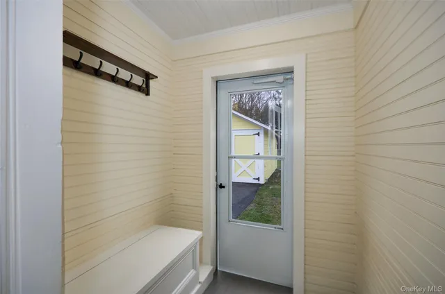 a bathroom with a shower and a sink