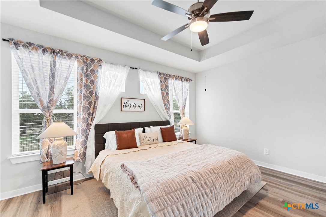 1616 Craftsman Road New Braunfels, TX 78132 - Photo 16 of 29 a bedroom with a bed and a window