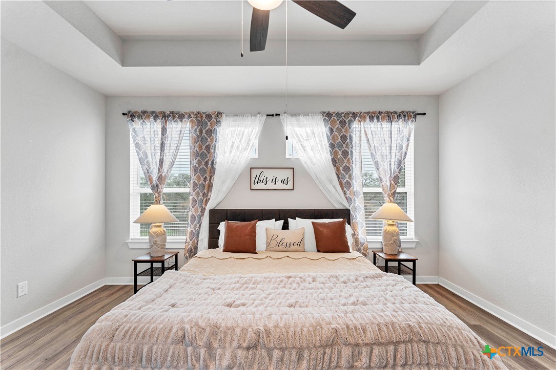1616 Craftsman Road New Braunfels, TX 78132 - Photo 17 of 29 a bedroom with a bed and window