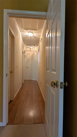 a view of a hallway with entryway