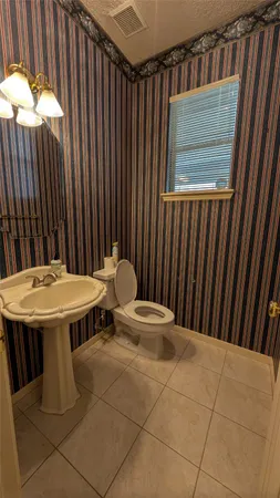 a view of a balcony furniture and bathroom