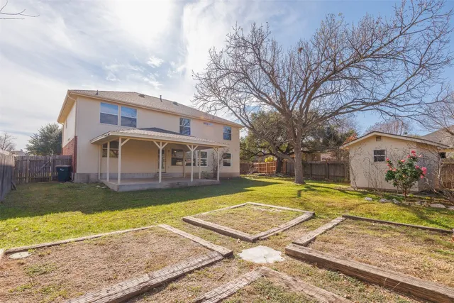 a front view of house with yard