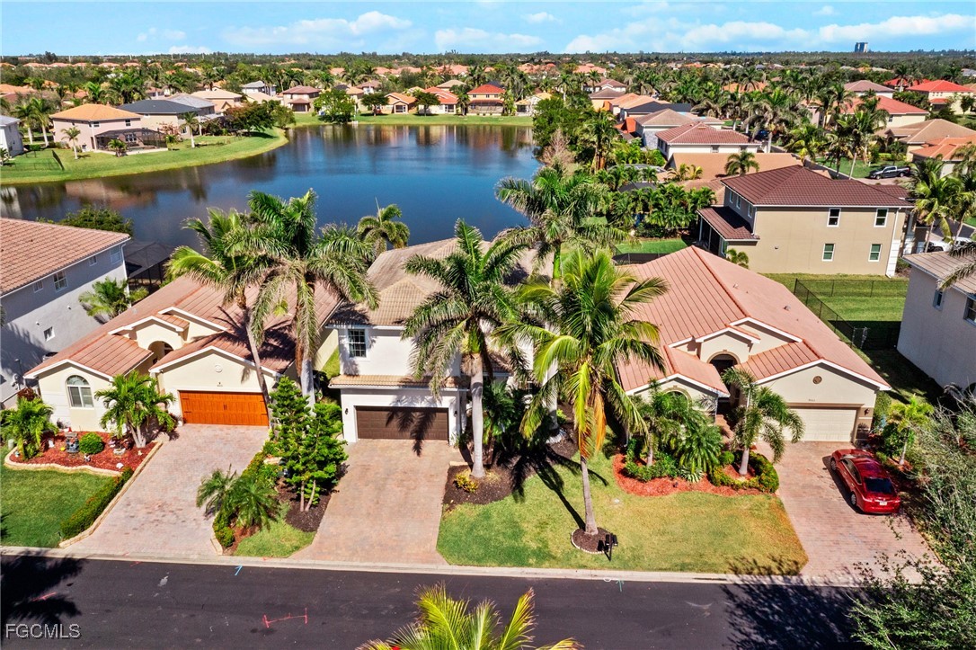 8657 Sumner Avenue Fort Myers, FL 33908 - Photo 27 of 29 an aerial view of residential houses with outdoor space