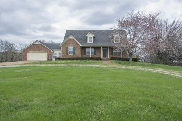 836 Hickory Ridge Trail Columbia, TN 38401 - Photo 3 of 20 Wrap around front porch beckons. 2 Car Attached garage makes for easy loading and unloading.