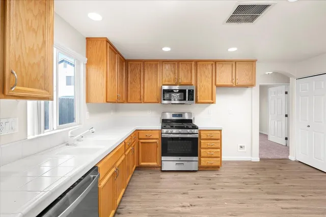a view of wooden floor in an empty room