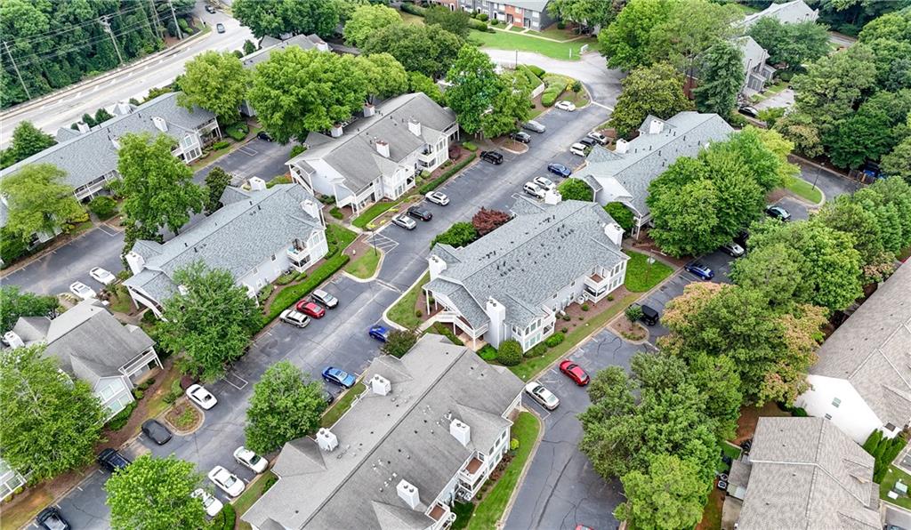 1007 Olde Mill Lane Norcross, GA 30093 - Photo 29 of 32 an aerial view of multiple houses with yard