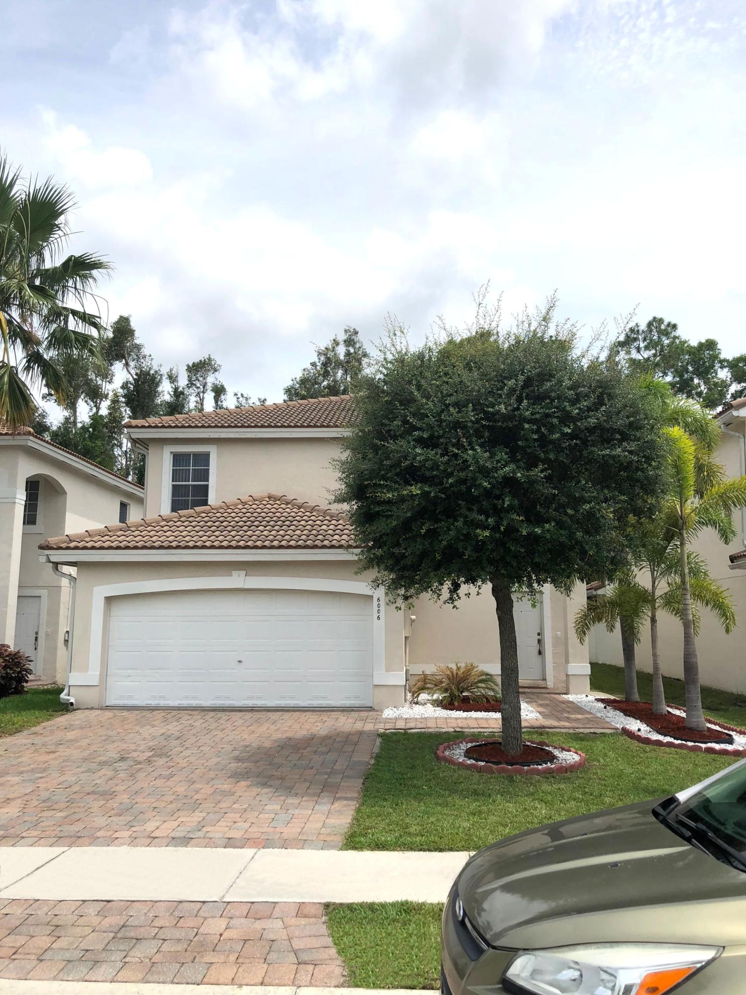 6006 Adriatic Way Greenacres, FL 33413 - Photo 1 of 33 front house 11 6006
