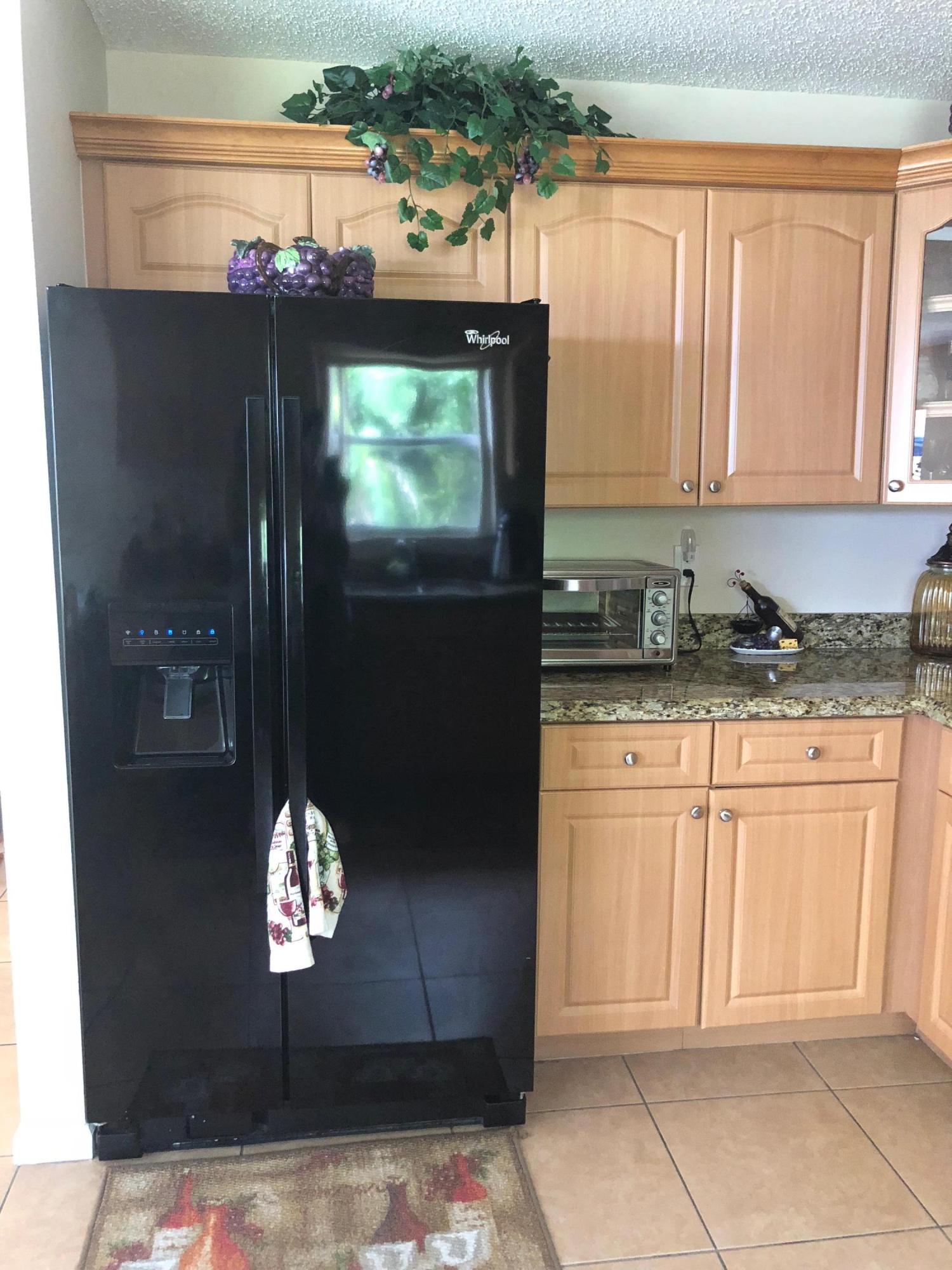 6006 Adriatic Way Greenacres, FL 33413 - Photo 11 of 33 kitchen 2 6006