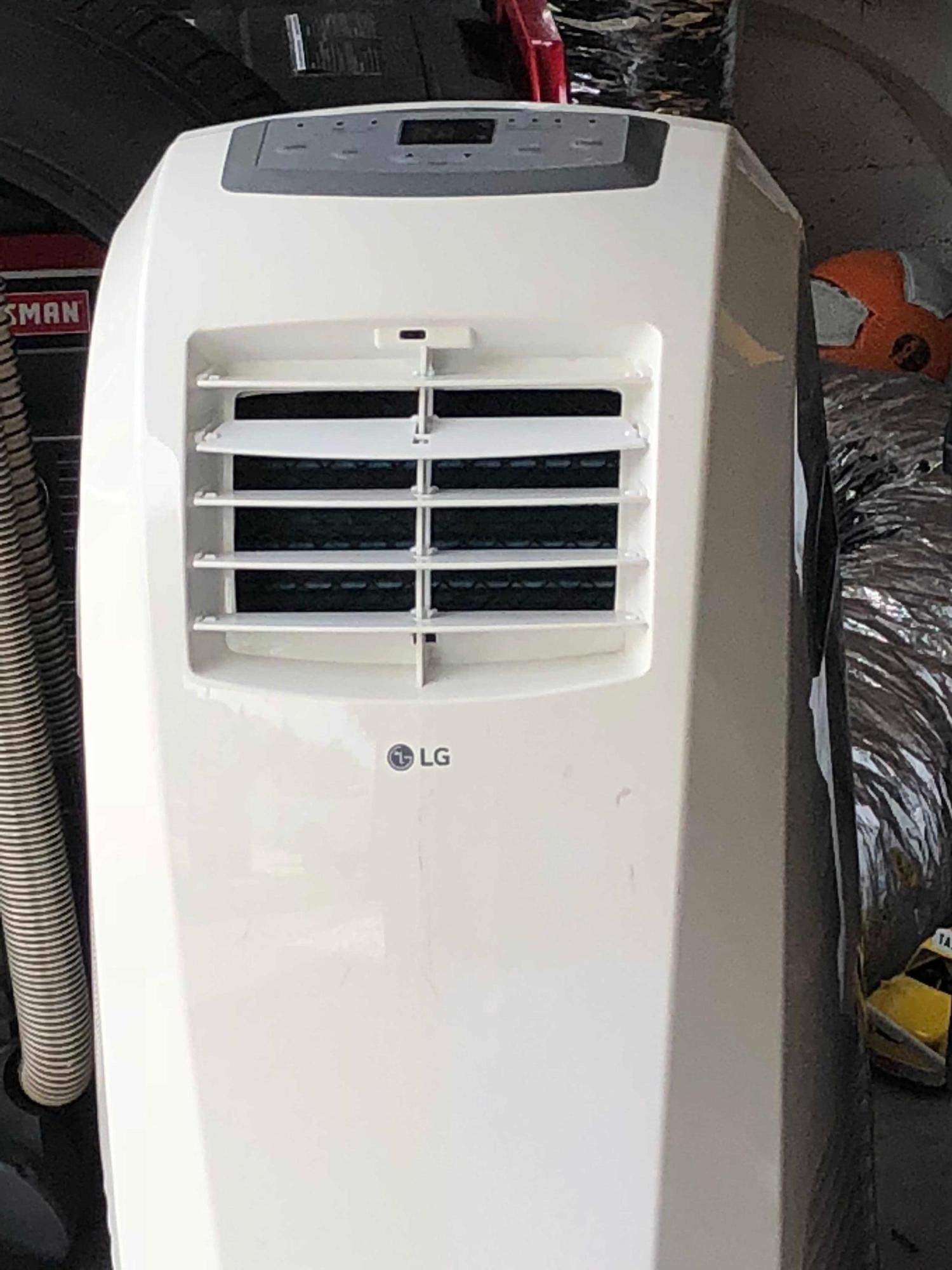 6006 Adriatic Way Greenacres, FL 33413 - Photo 28 of 33 Portable garage AC