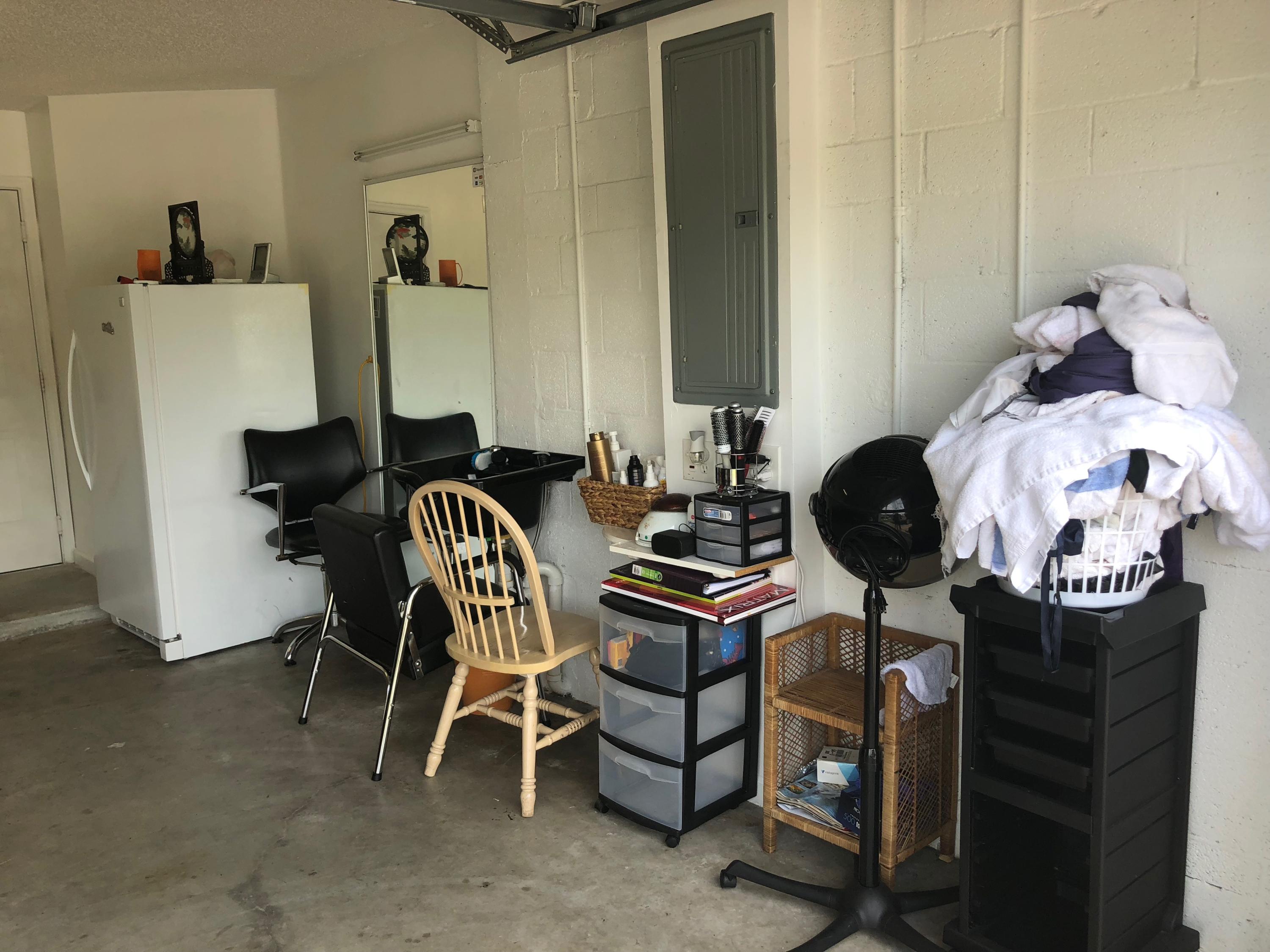 6006 Adriatic Way Greenacres, FL 33413 - Photo 29 of 33 garage working area 6006