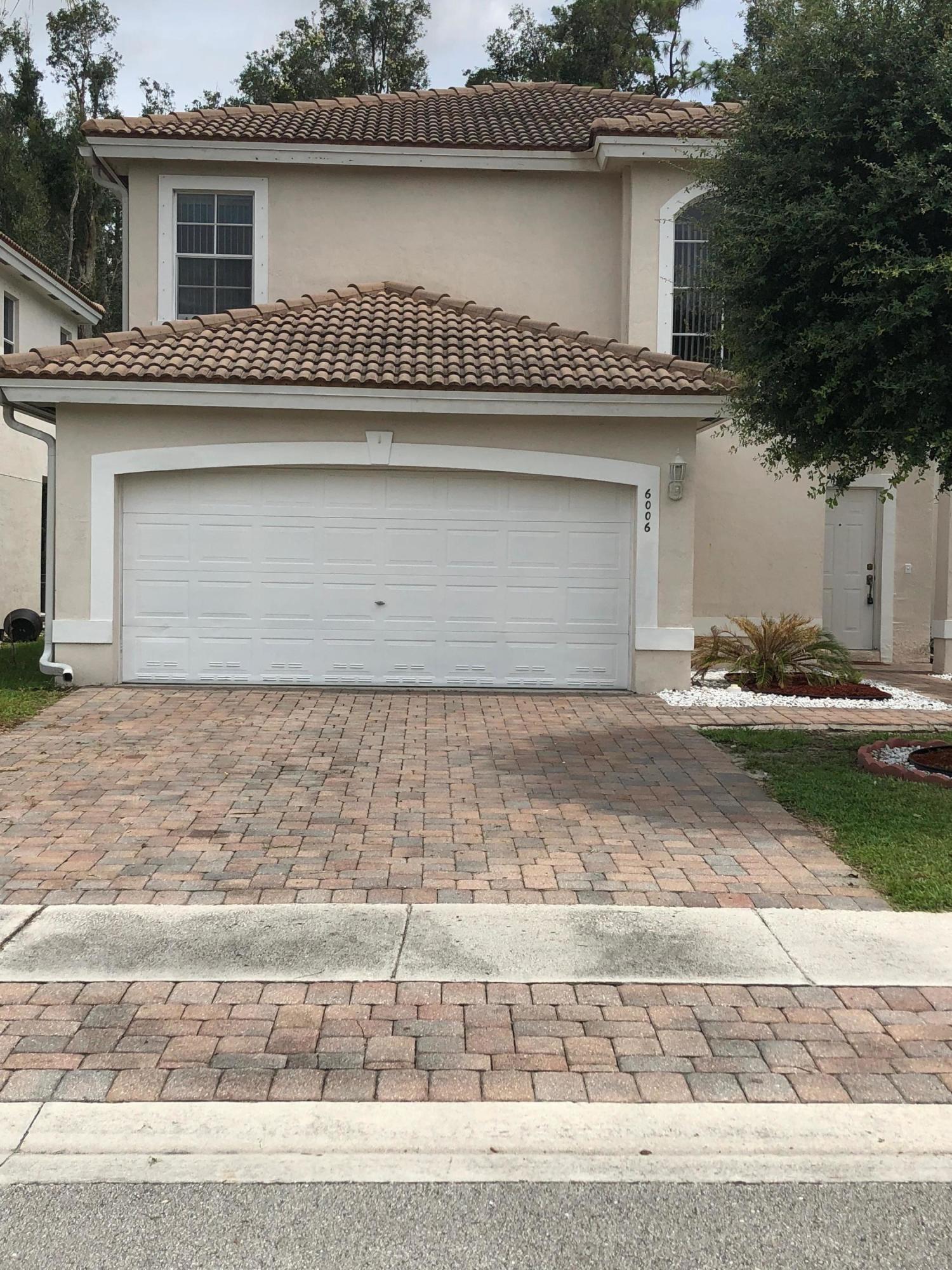 6006 Adriatic Way Greenacres, FL 33413 - Photo 3 of 33 front pic