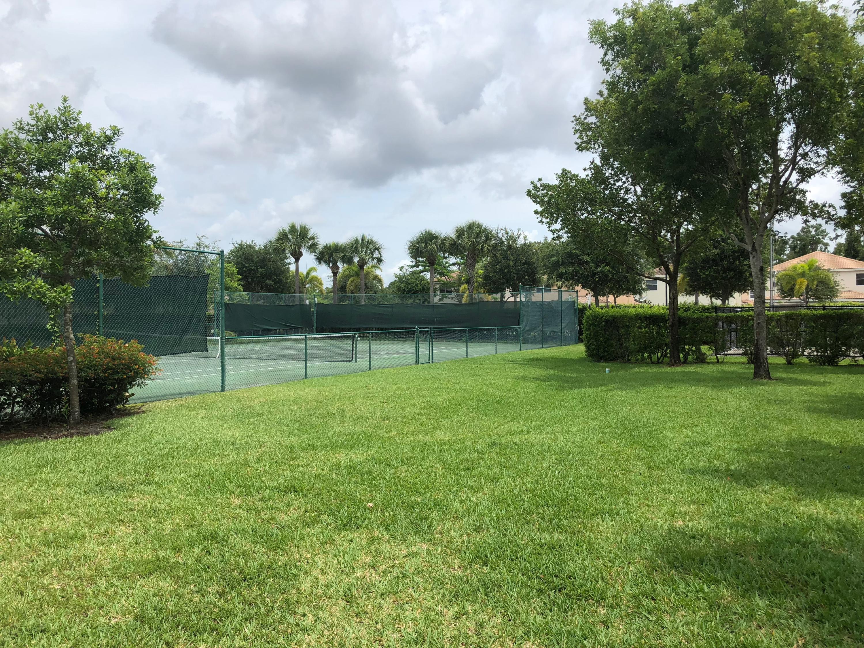 6006 Adriatic Way Greenacres, FL 33413 - Photo 33 of 33 tennis court 6006