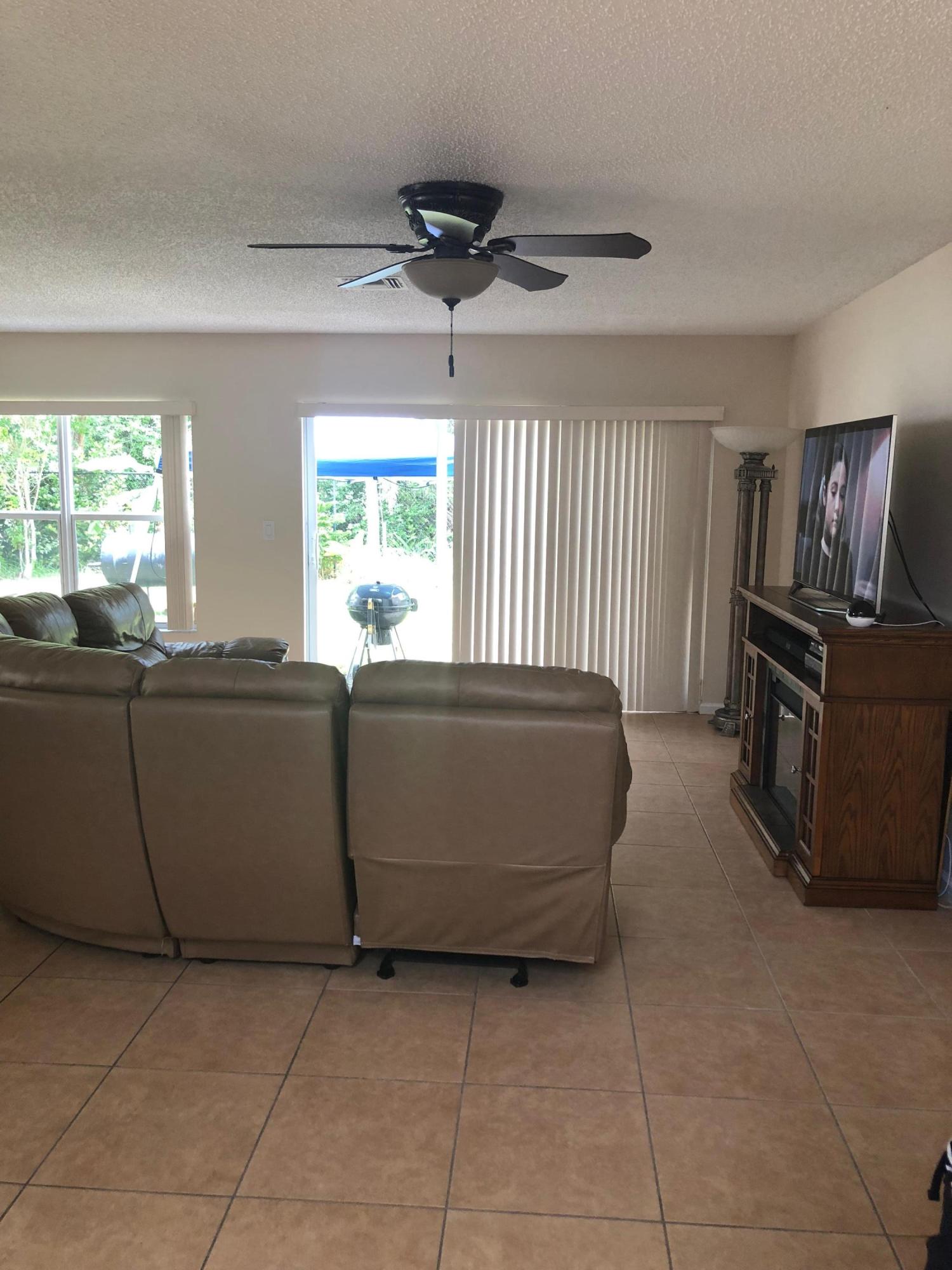 6006 Adriatic Way Greenacres, FL 33413 - Photo 6 of 33 living room 6006