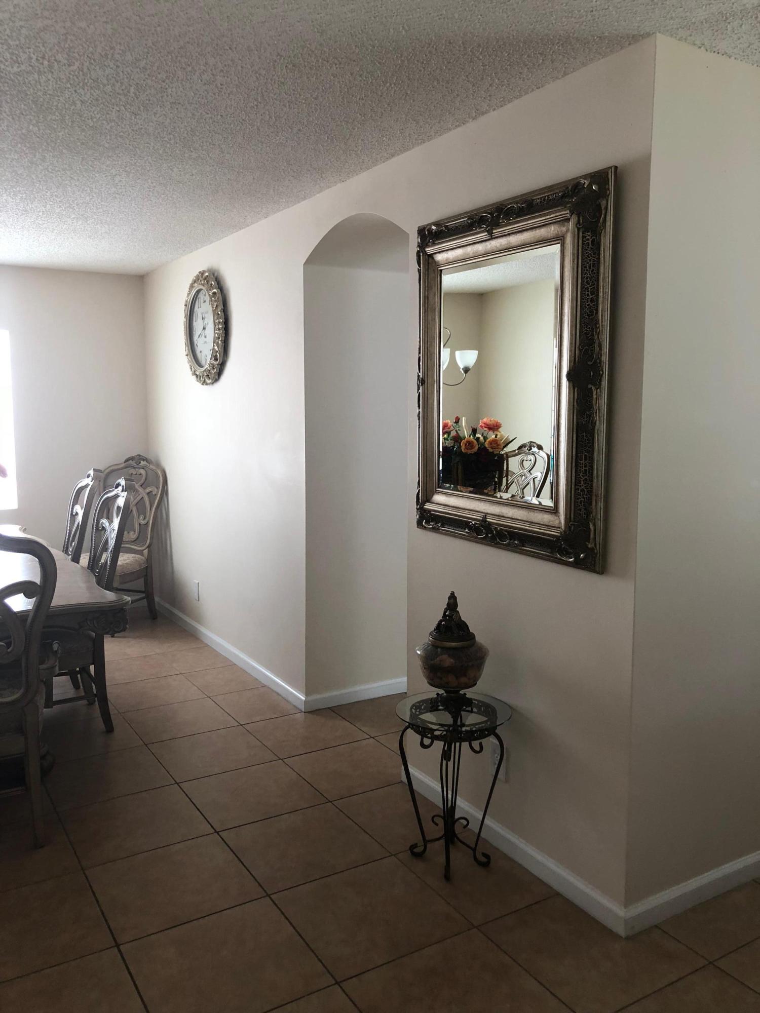 6006 Adriatic Way Greenacres, FL 33413 - Photo 8 of 33 formal dinning side
