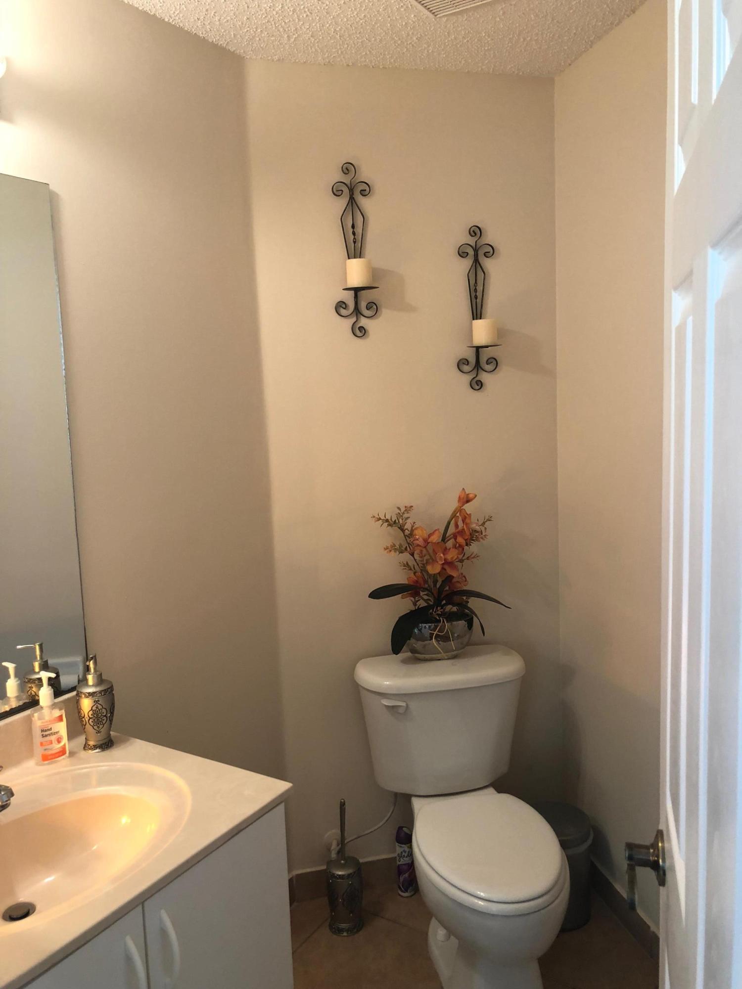 6006 Adriatic Way Greenacres, FL 33413 - Photo 9 of 33 haft bathroom 6006