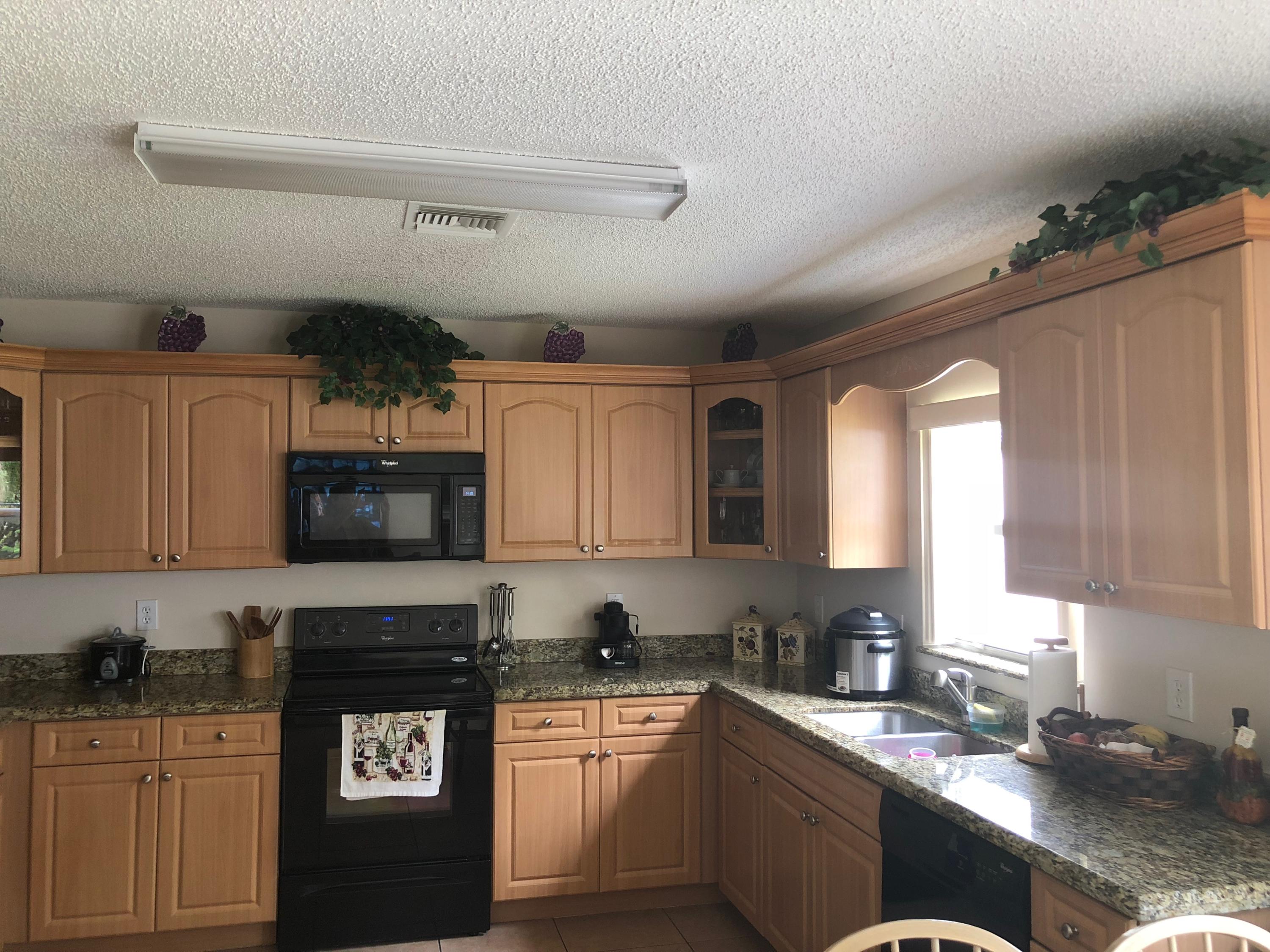 6006 Adriatic Way Greenacres, FL 33413 - Photo 10 of 33 kitchen 1 6006