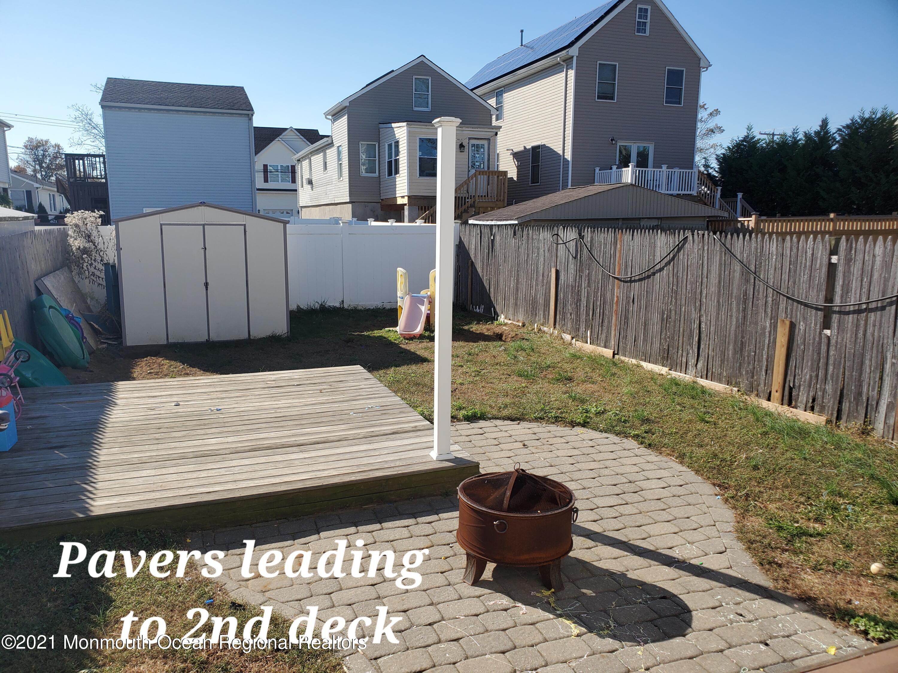 804 7th Street Union Beach, NJ 07735 - Photo 13 of 14 a view of a back yard of the house