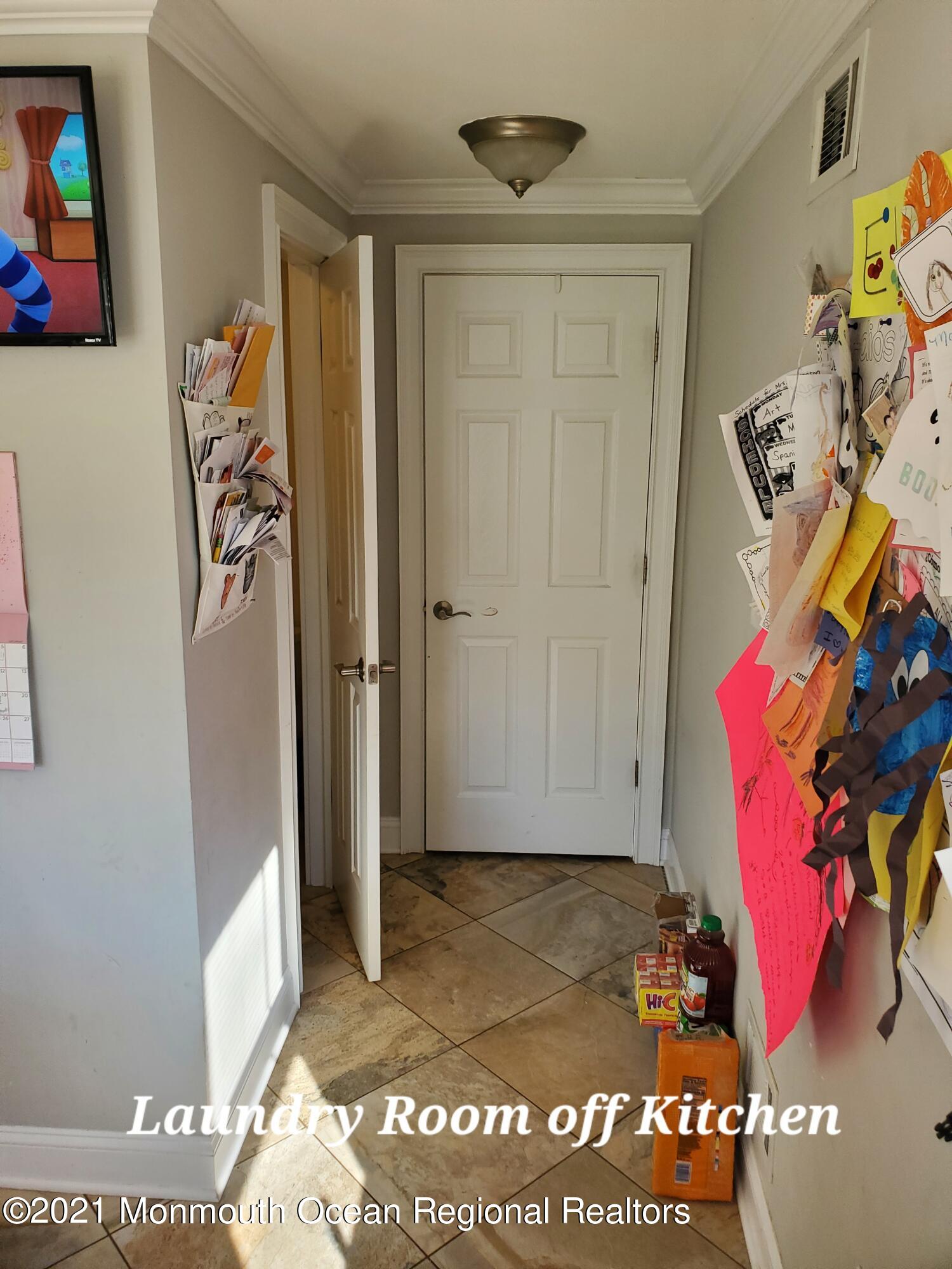 804 7th Street Union Beach, NJ 07735 - Photo 8 of 14 a view of a closet in a utility room