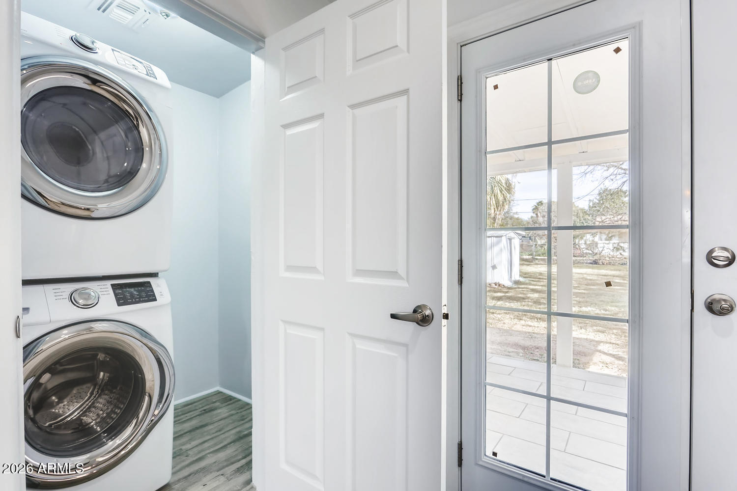1215 South Judd Street Tempe, AZ 85281 - Photo 13 of 18 a view of a hallway with washer and dryer