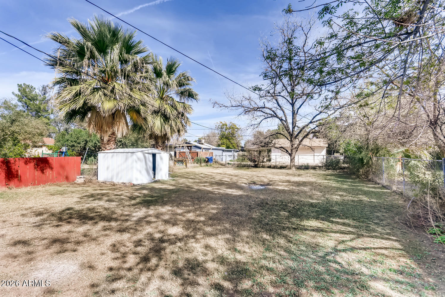 1215 South Judd Street Tempe, AZ 85281 - Photo 16 of 18 a view of a yard with a trees
