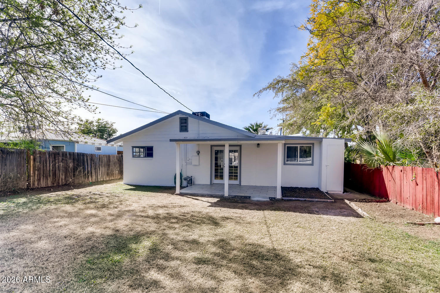 1215 South Judd Street Tempe, AZ 85281 - Photo 18 of 18 a house with trees in front of it