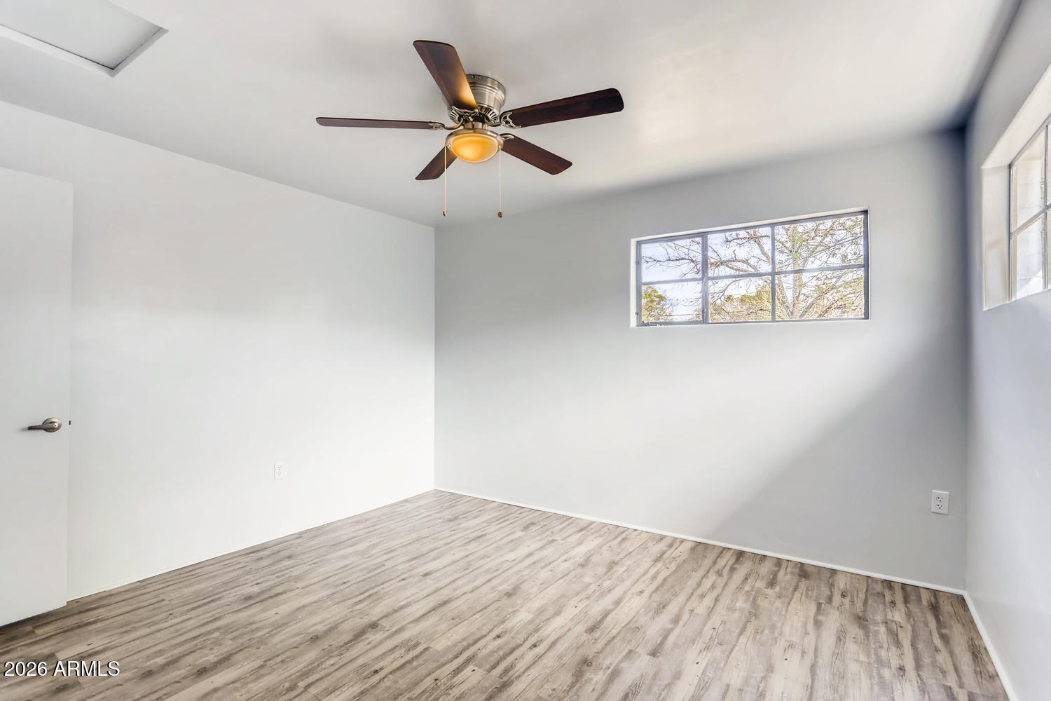 1215 South Judd Street Tempe, AZ 85281 - Photo 10 of 18 a view of room with a ceiling fan