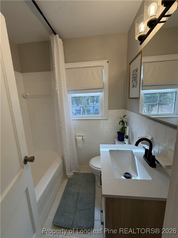 211 North Dickson Street Raeford, NC 28376 - Photo 14 of 14 a bathroom with a sink toilet and shower