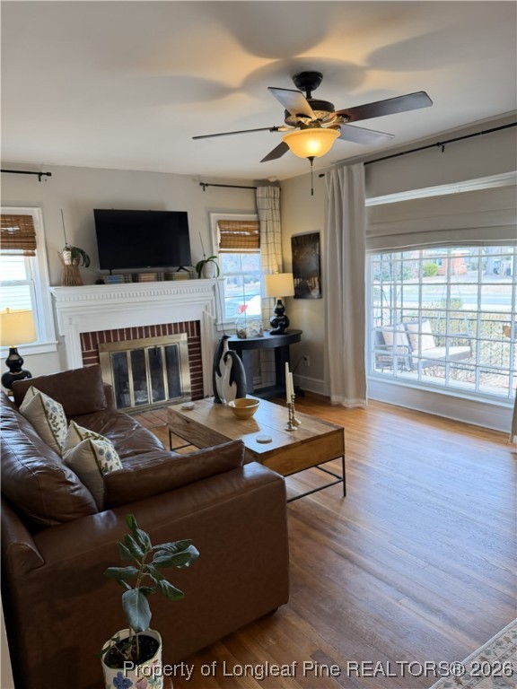211 North Dickson Street Raeford, NC 28376 - Photo 5 of 14 a living room with furniture and a flat screen tv