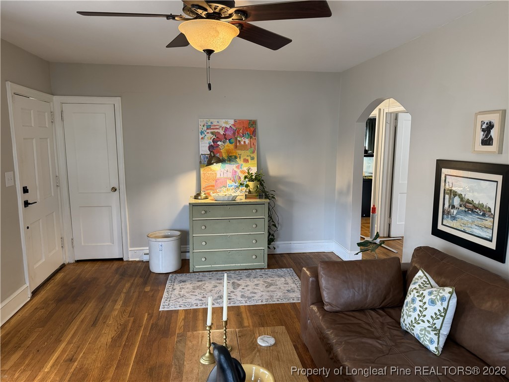 211 North Dickson Street Raeford, NC 28376 - Photo 6 of 14 a living room with furniture and a rug