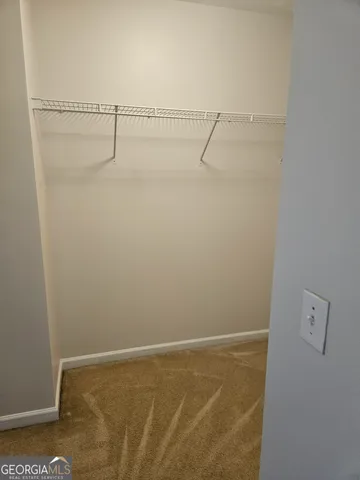 a view of small space with racks on the wall