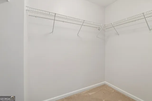 a view of a room with racks on the wall