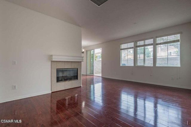 a view of a kitchen with a sink and dishwasher