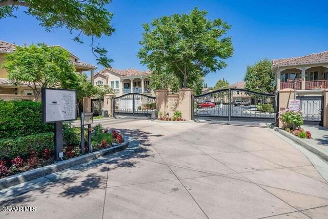 a house with trees in front of it