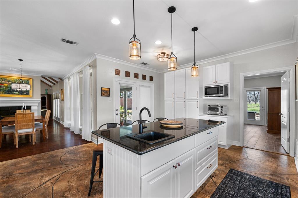 8903 Ravenswood Road Granbury, TX 76049 - Photo 11 of 36 View From Kitchen to Dining