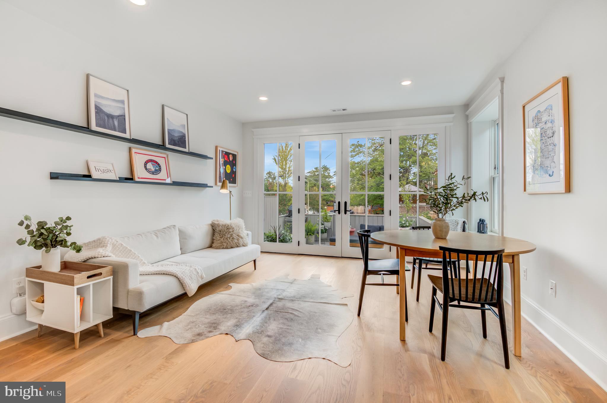 326 D Street Northeast Washington, DC 20002 - Photo 14 of 53 a living room with furniture and a large window