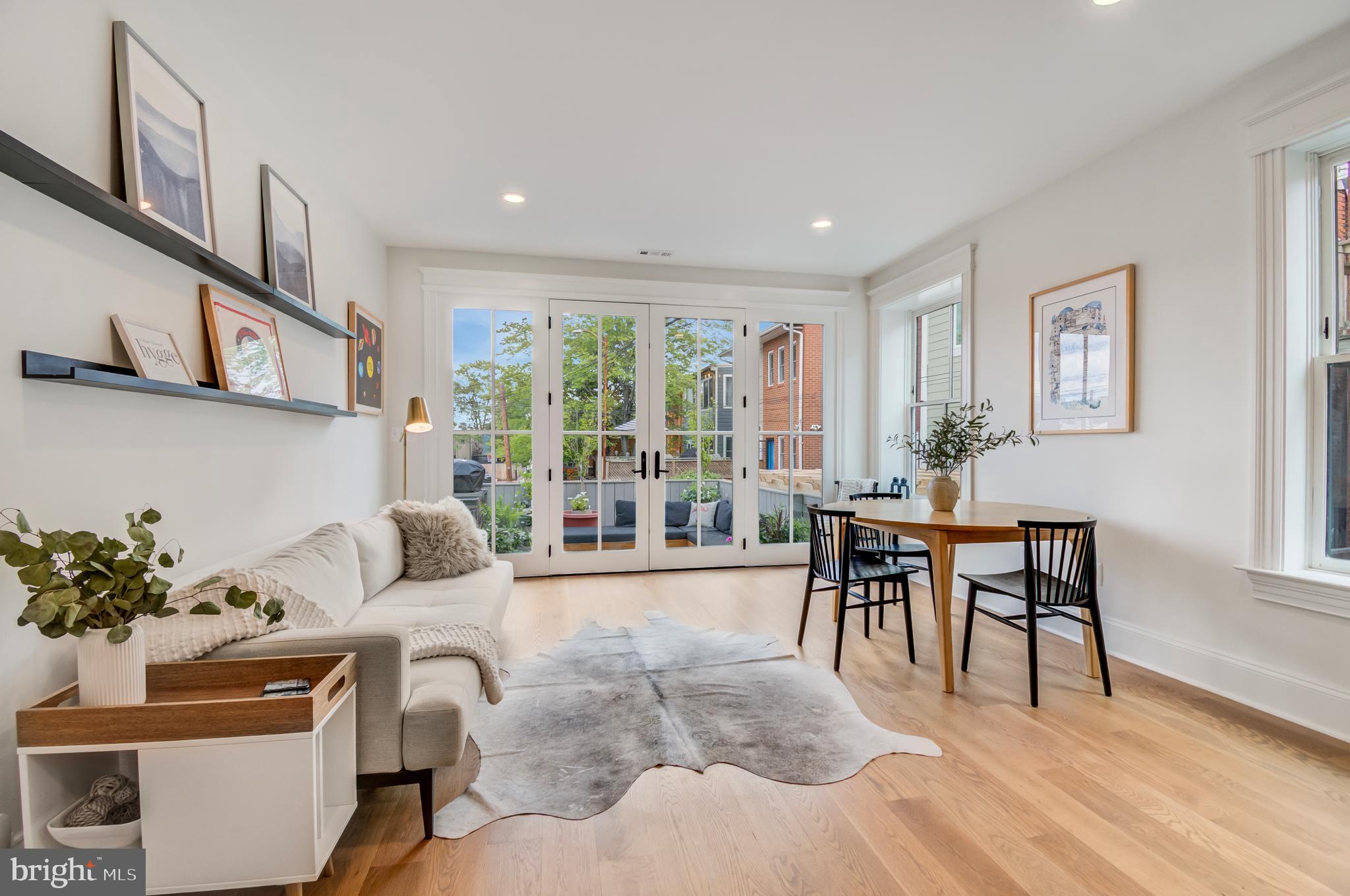 326 D Street Northeast Washington, DC 20002 - Photo 16 of 53 a living room with furniture and a wooden floor