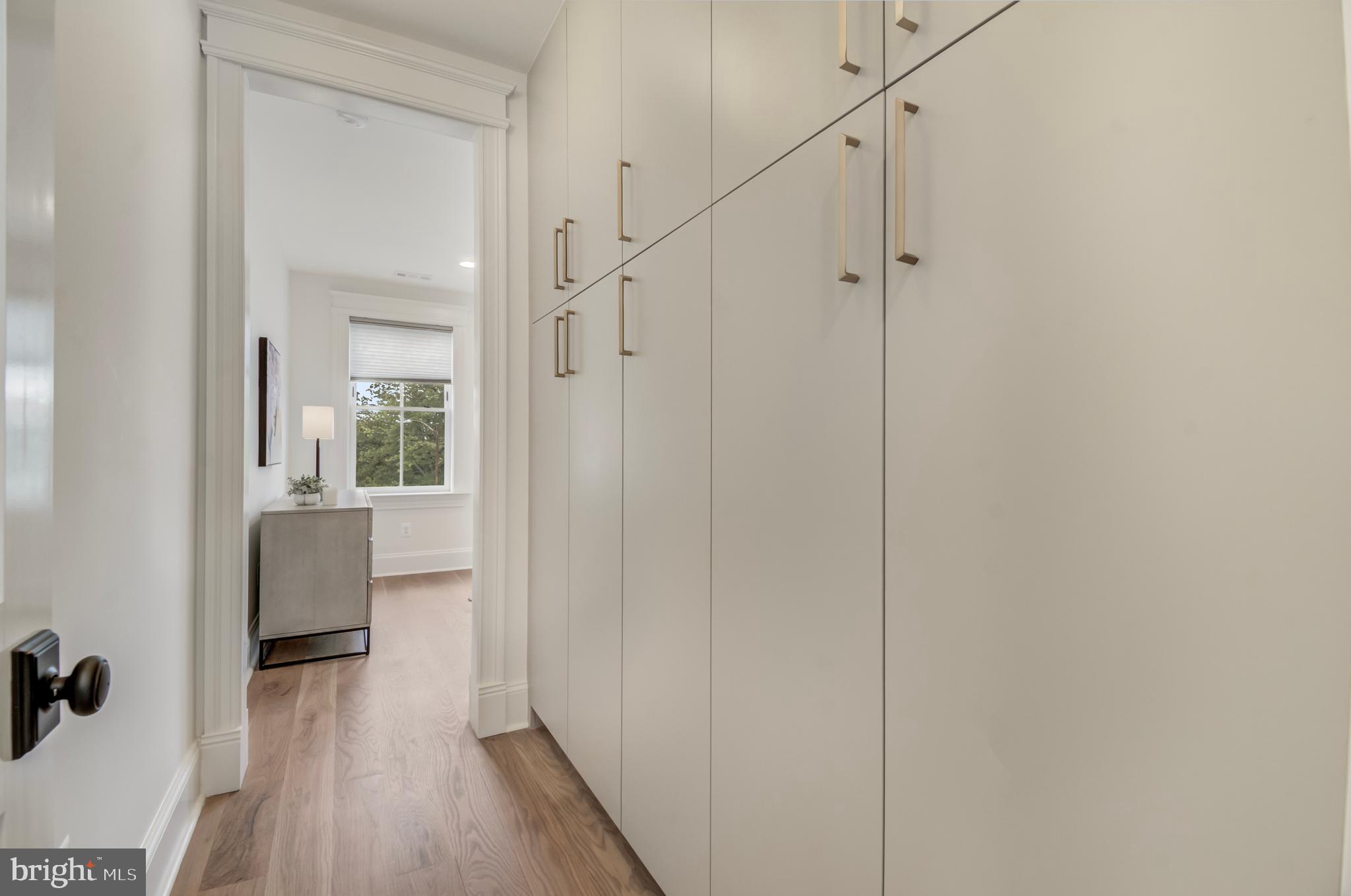 326 D Street Northeast Washington, DC 20002 - Photo 27 of 53 a view of a hallway with wooden floor and closet