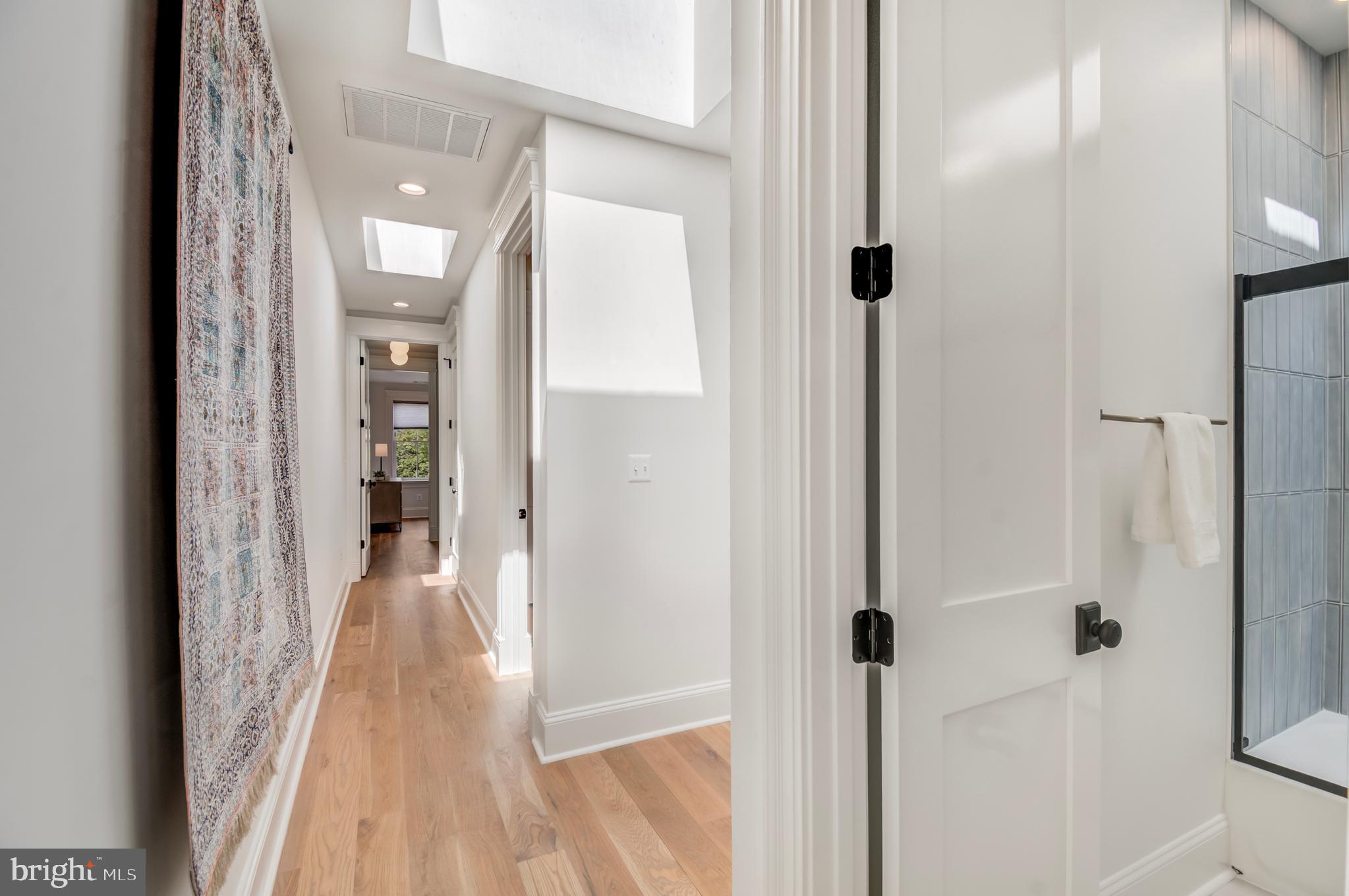 326 D Street Northeast Washington, DC 20002 - Photo 31 of 53 a view of a bathroom from a hallway