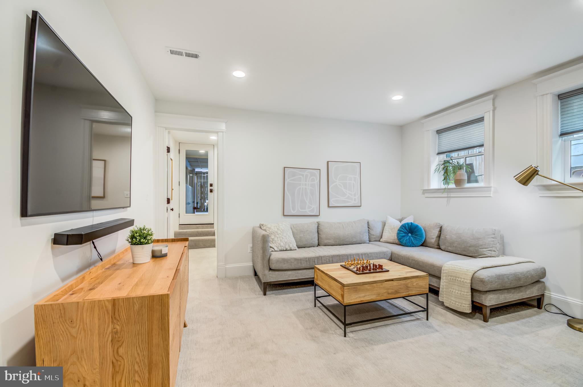 326 D Street Northeast Washington, DC 20002 - Photo 37 of 53 a living room with furniture and a couch