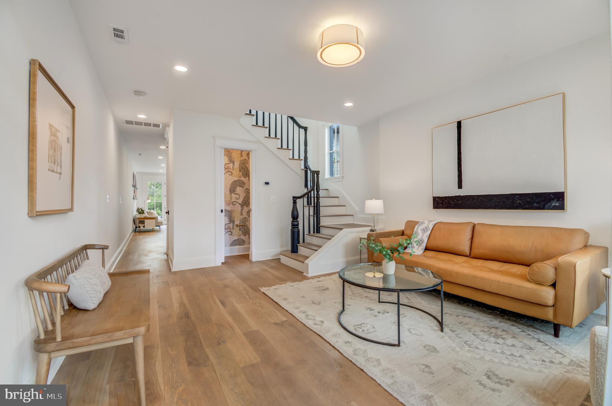 326 D Street Northeast Washington, DC 20002 - Photo 4 of 53 a living room with furniture and a couch