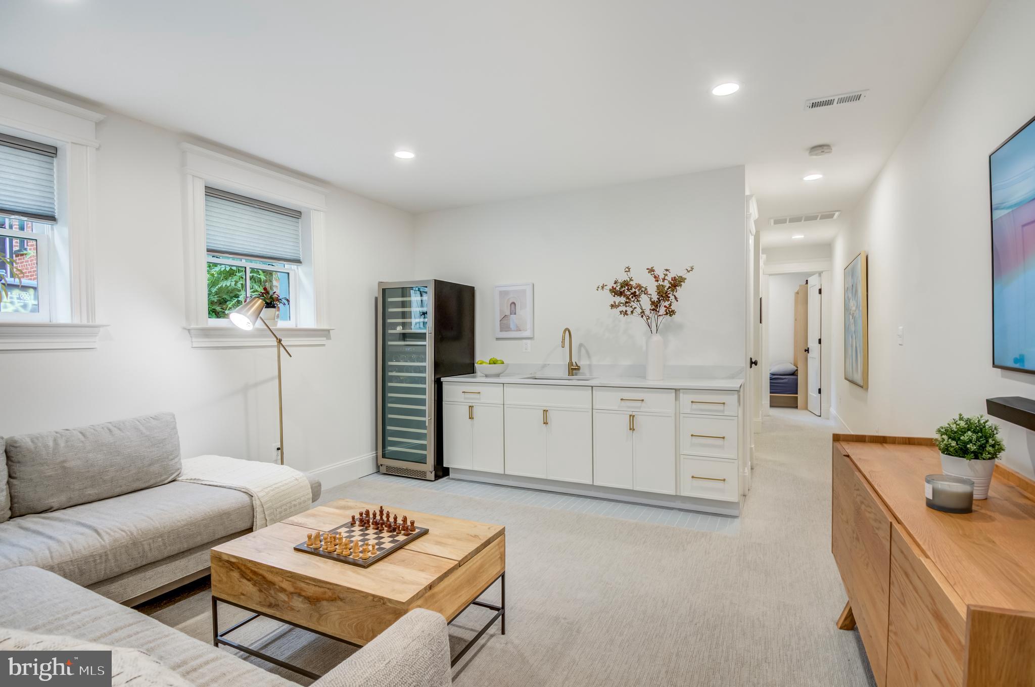 326 D Street Northeast Washington, DC 20002 - Photo 38 of 53 a living room with furniture and a open kitchen