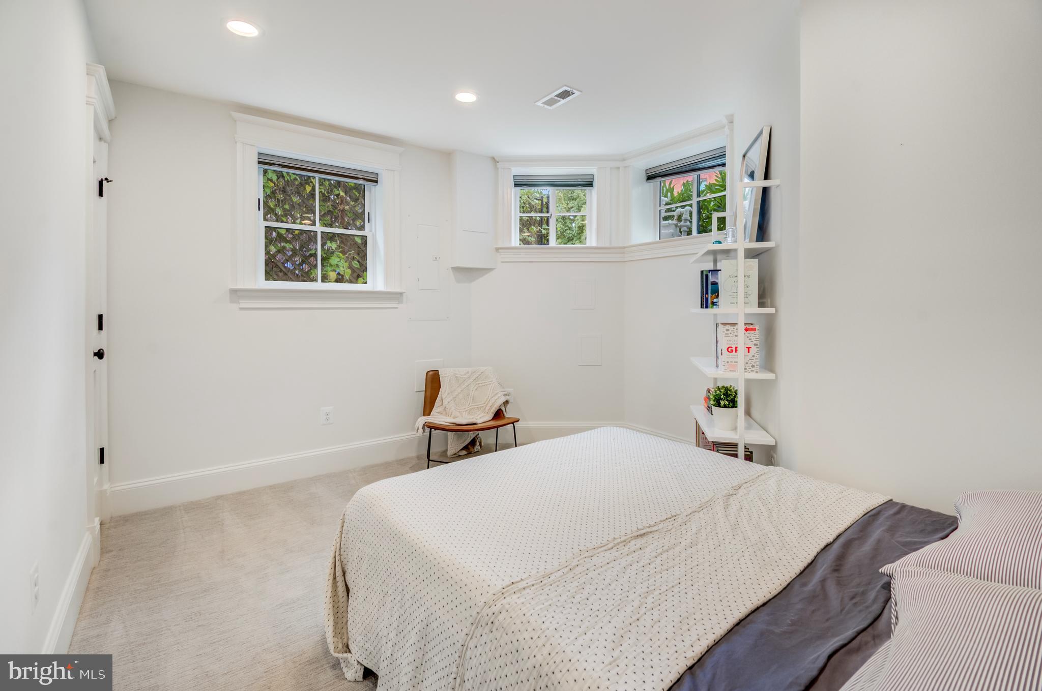 326 D Street Northeast Washington, DC 20002 - Photo 40 of 53 a bedroom with a bed and a window